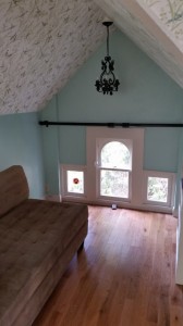 Attic awaiting drapery panels!  Has a new floor walls, ceiling, chandelier...